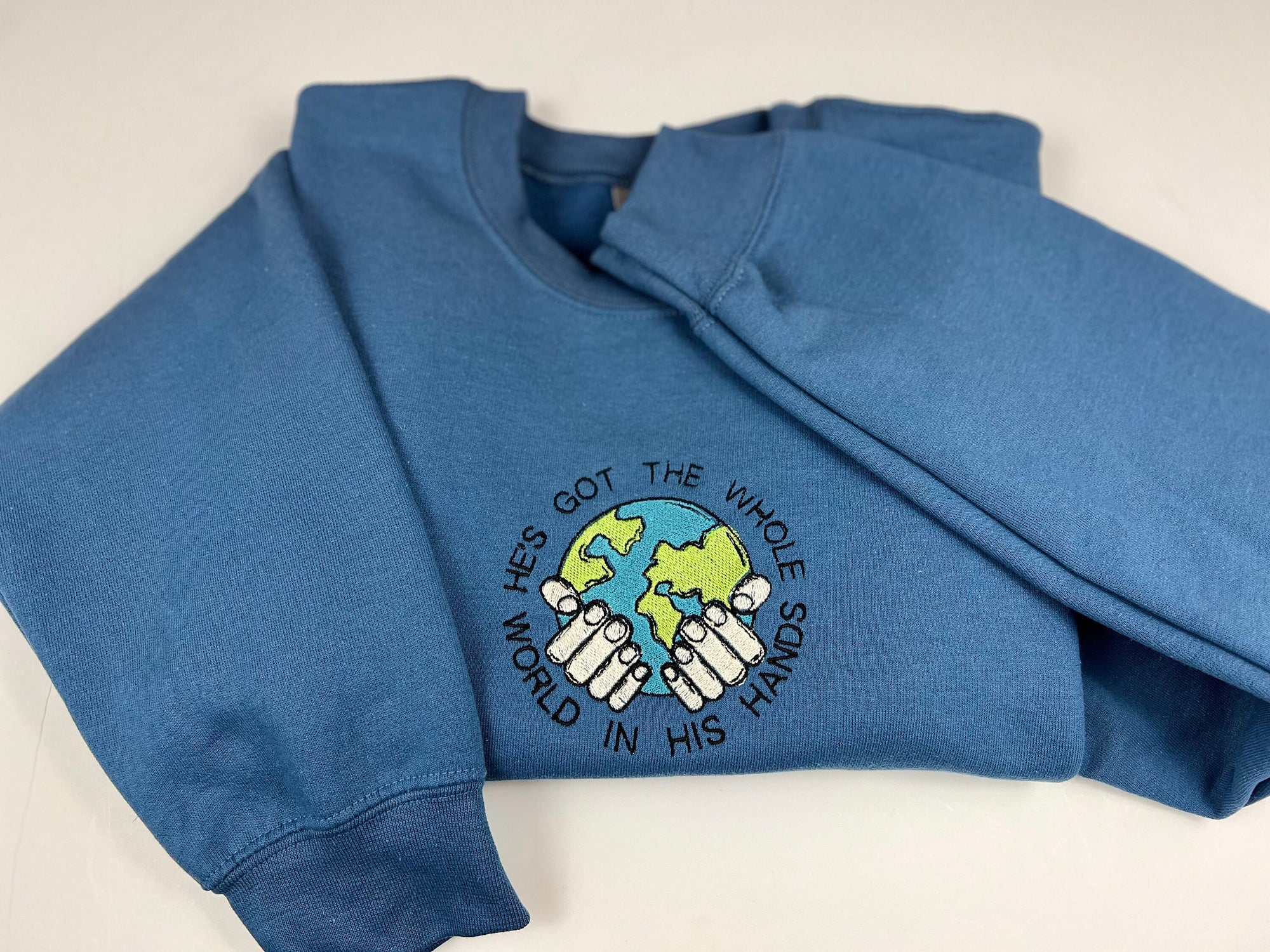 "He's Got the Whole World in His Hands" Crewneck Sweatshirt