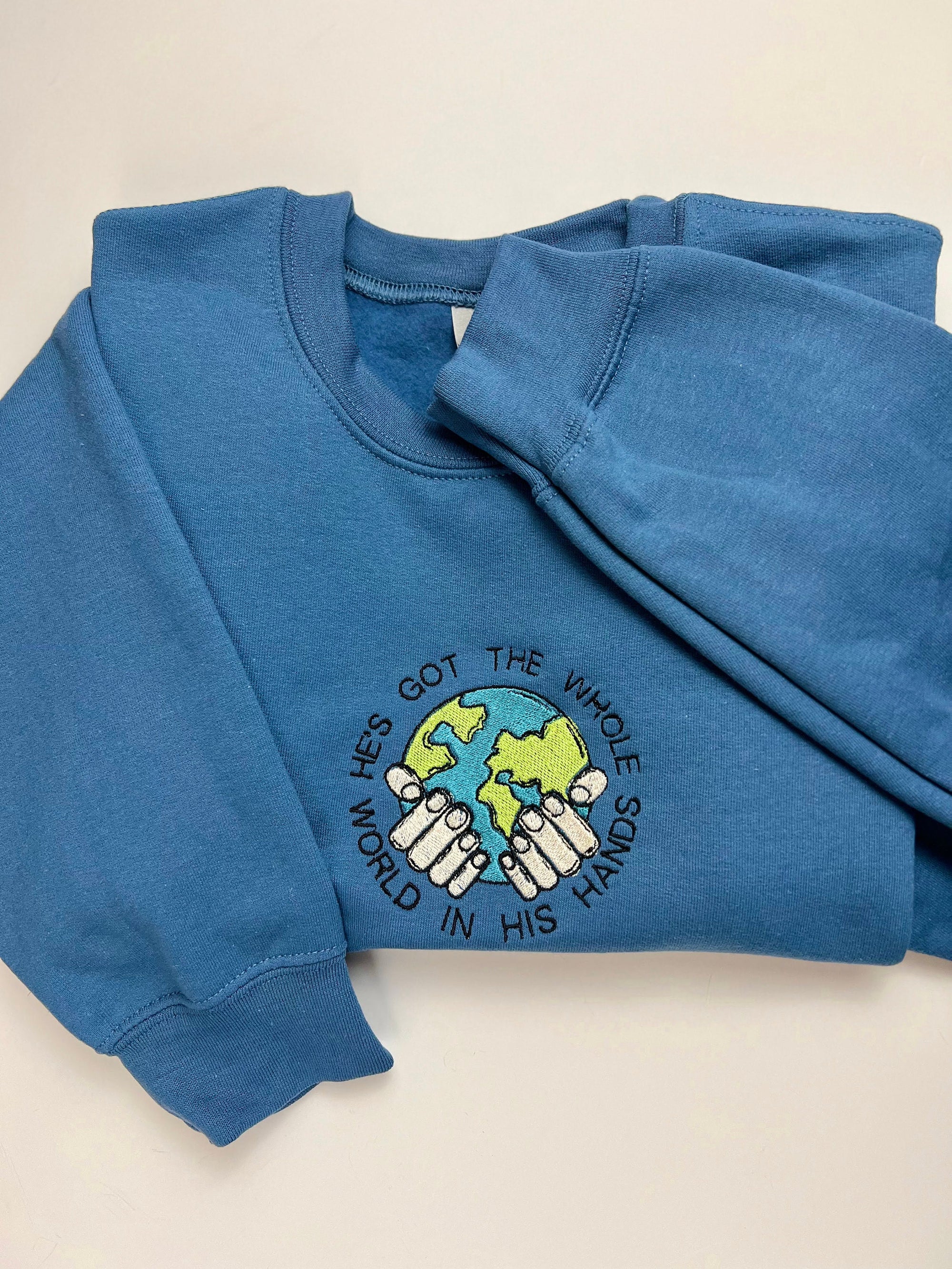 "He's Got the Whole World in His Hands" Crewneck Sweatshirt