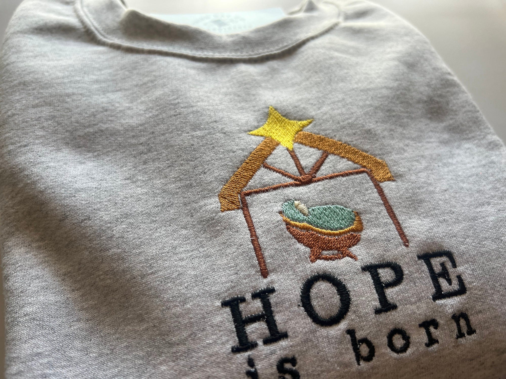 "He is Born" Crewneck Sweatshirt
