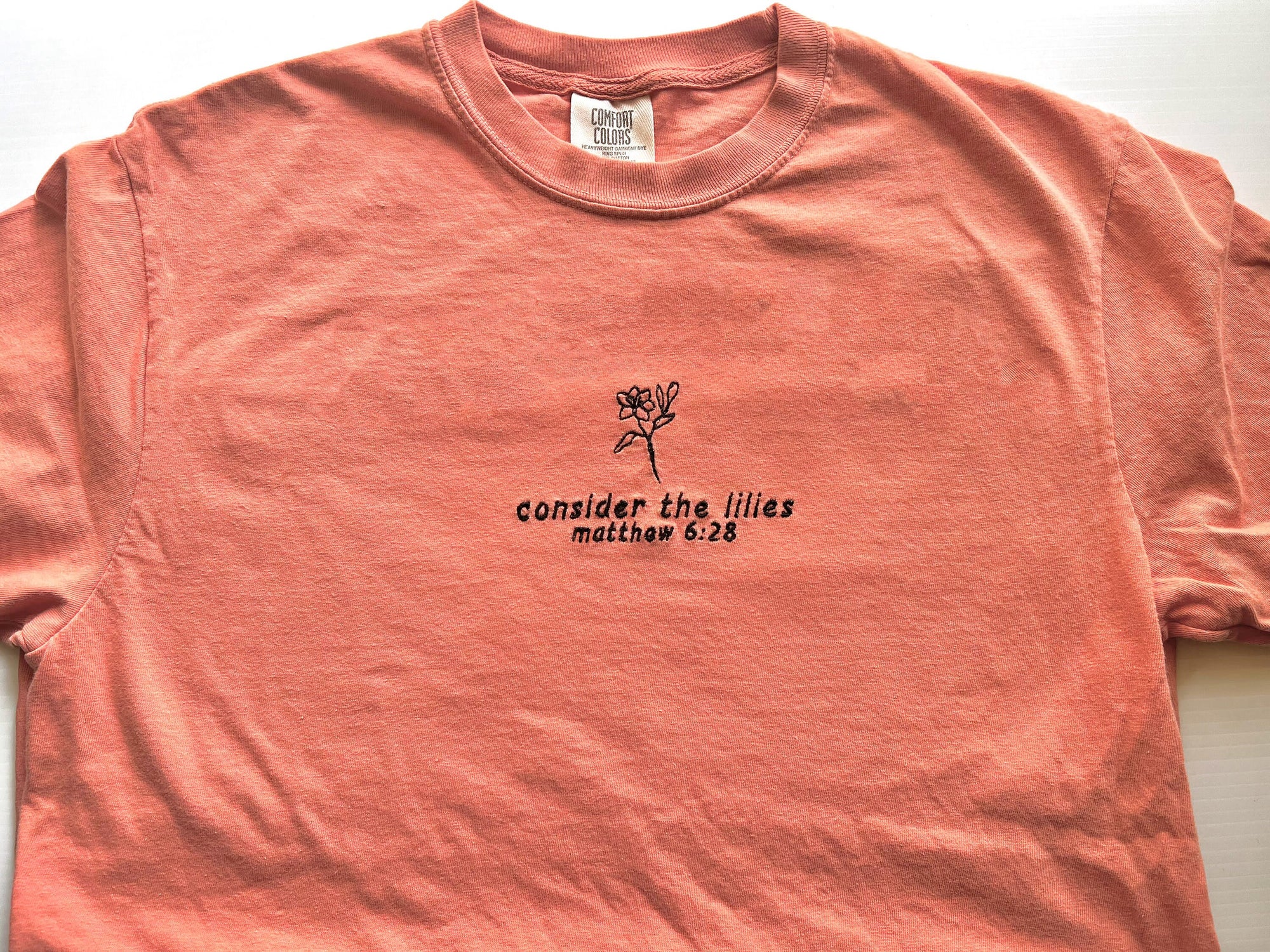 “Consider the Lilies” Comfort Colors T-Shirt | Terracotta