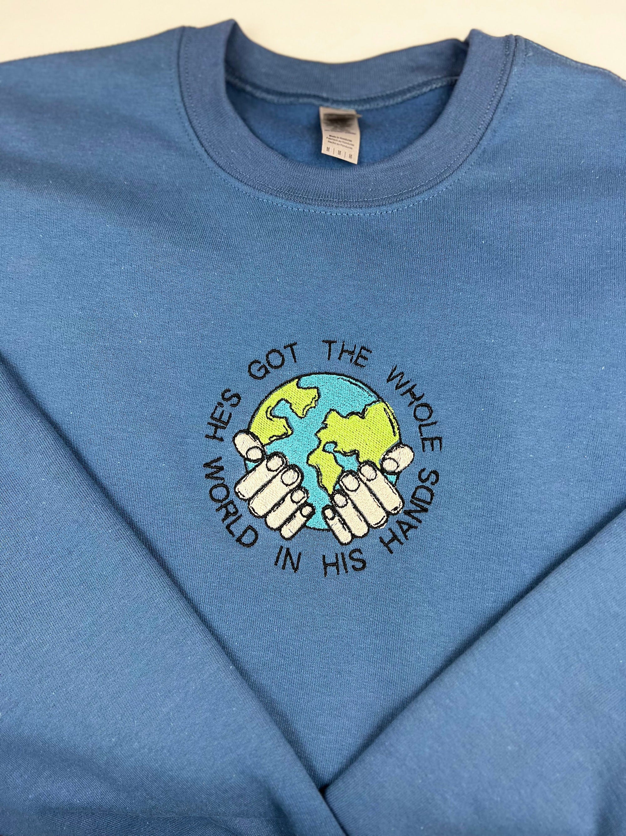 "He's Got the Whole World in His Hands" Crewneck Sweatshirt