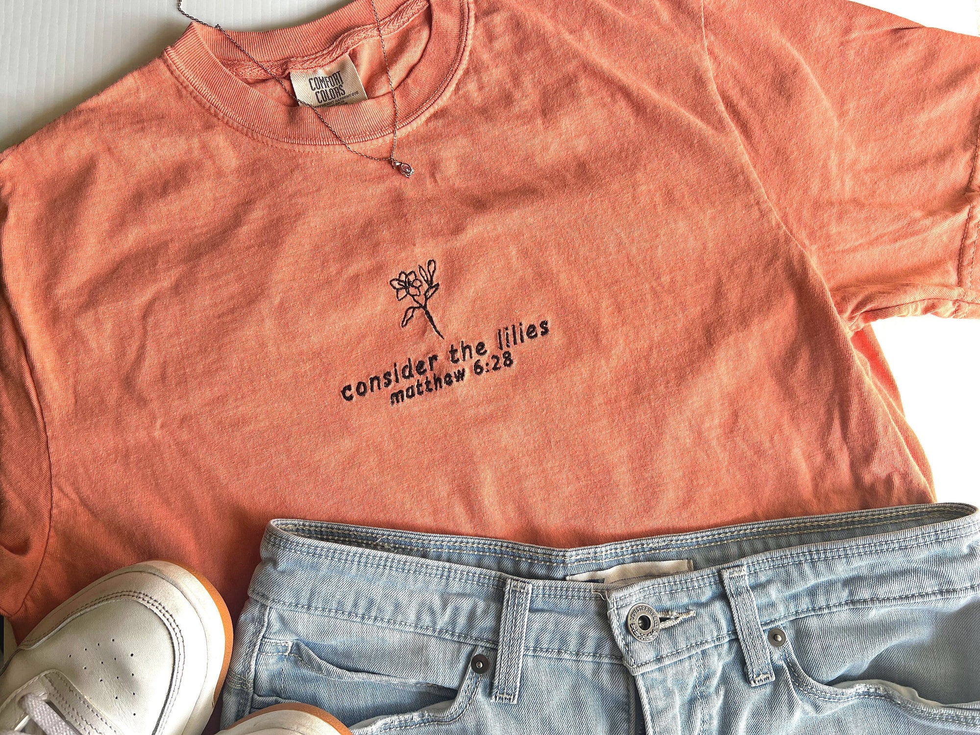 “Consider the Lilies” Comfort Colors T-Shirt | Terracotta