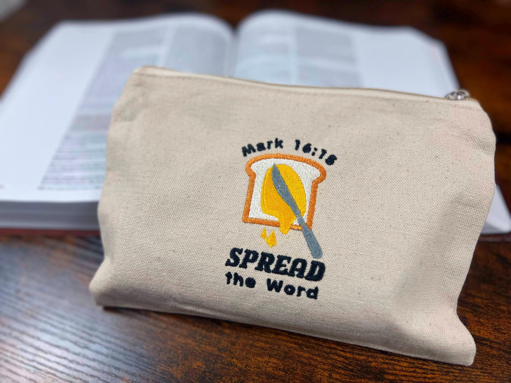 “Spread the Word” Zippered Canvas Pouch
