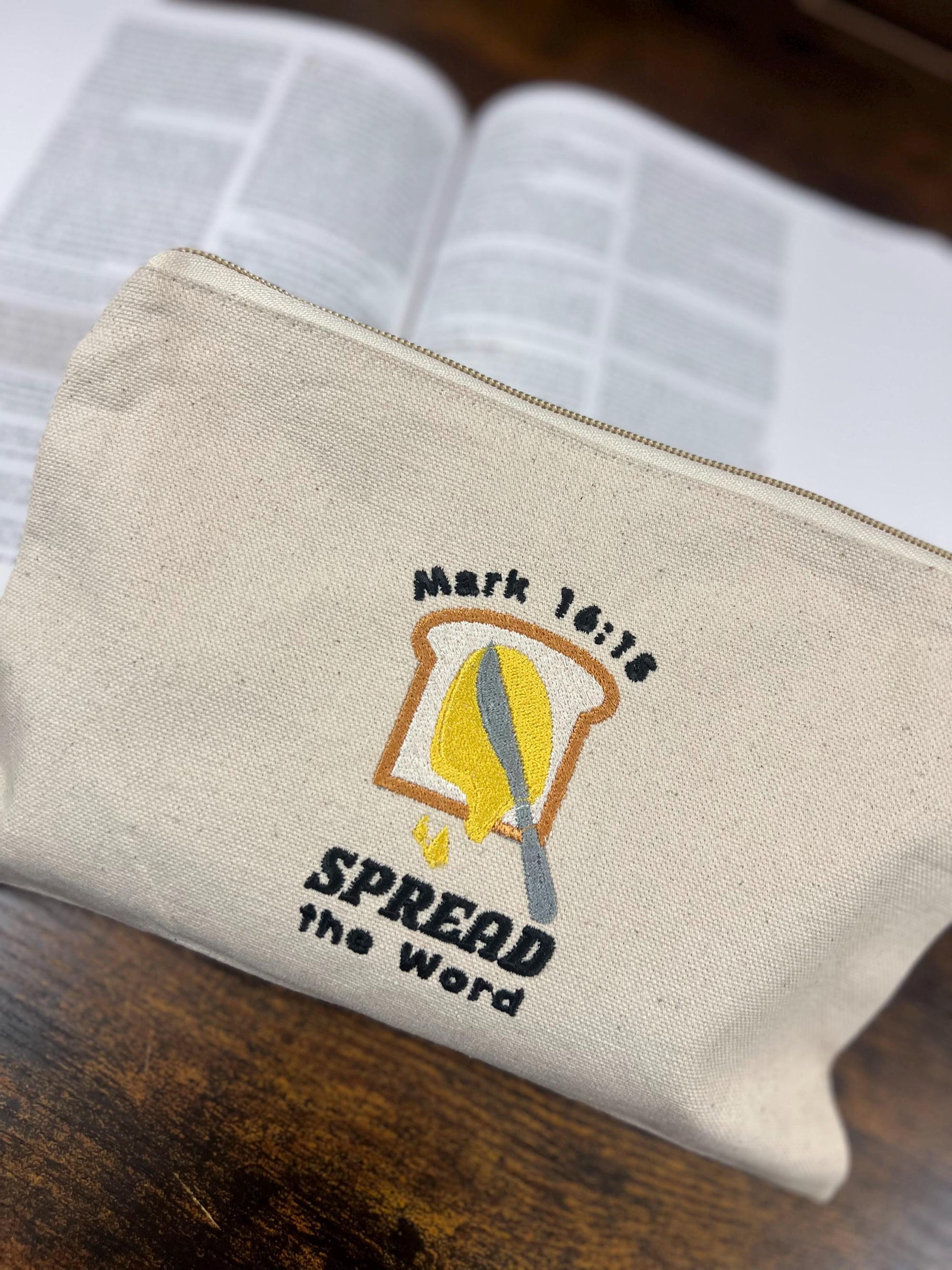 “Spread the Word” Zippered Canvas Pouch