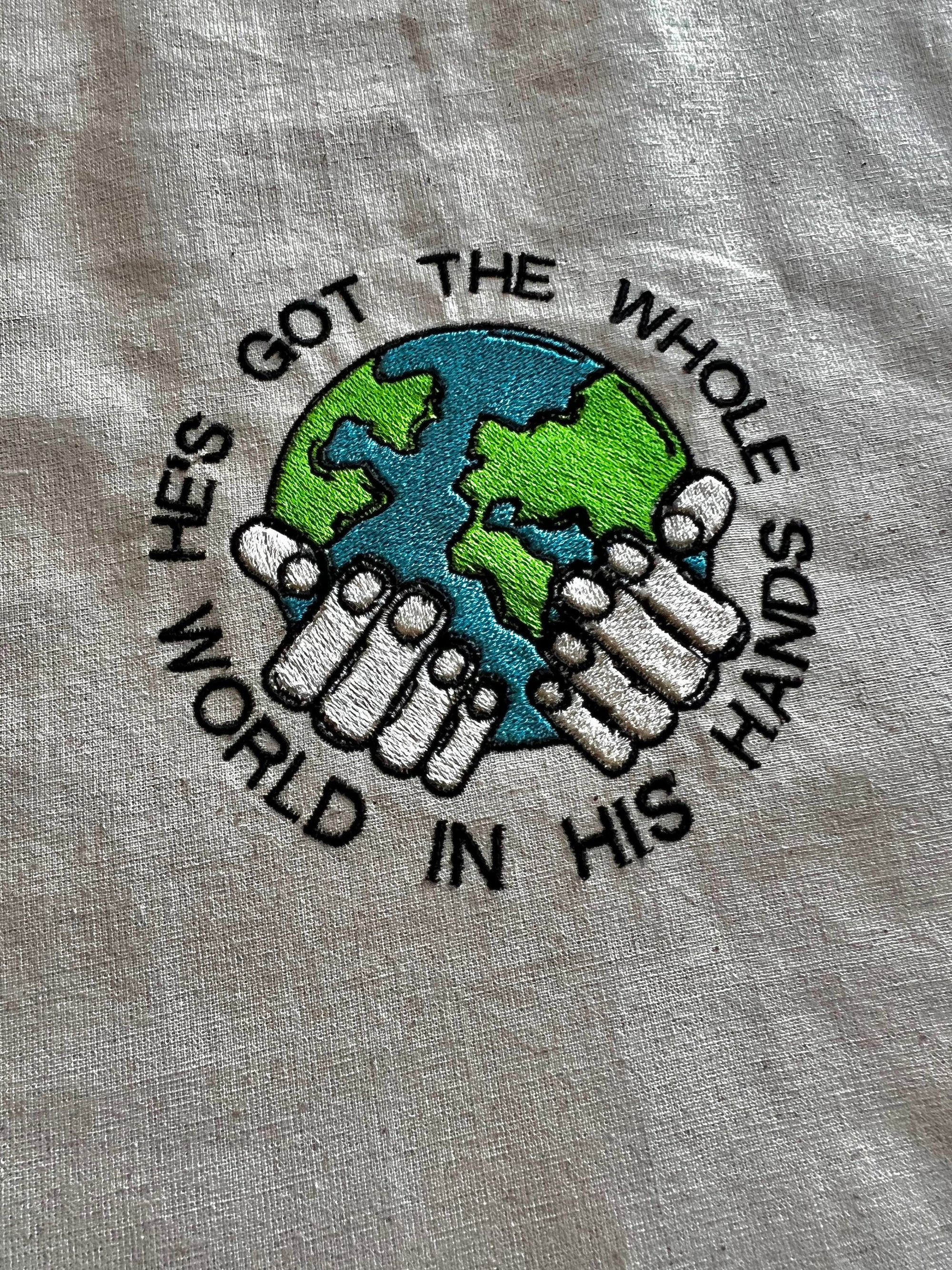“He’s Got the Whole World in His Hands” Tote Bag