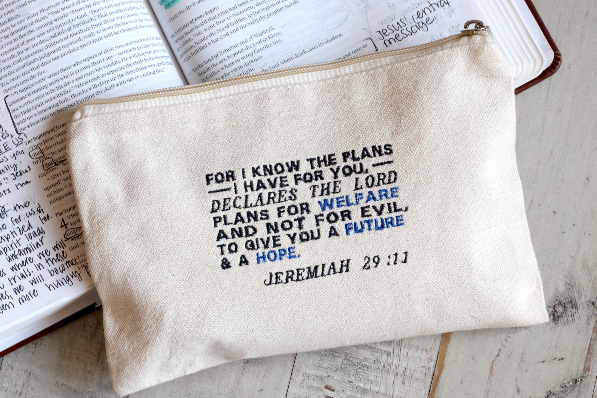 Jeremiah 29:11 zipper pouch with For I Know the Plans I Have for You in black and blue text, beige 100% cotton canvas Christian gift