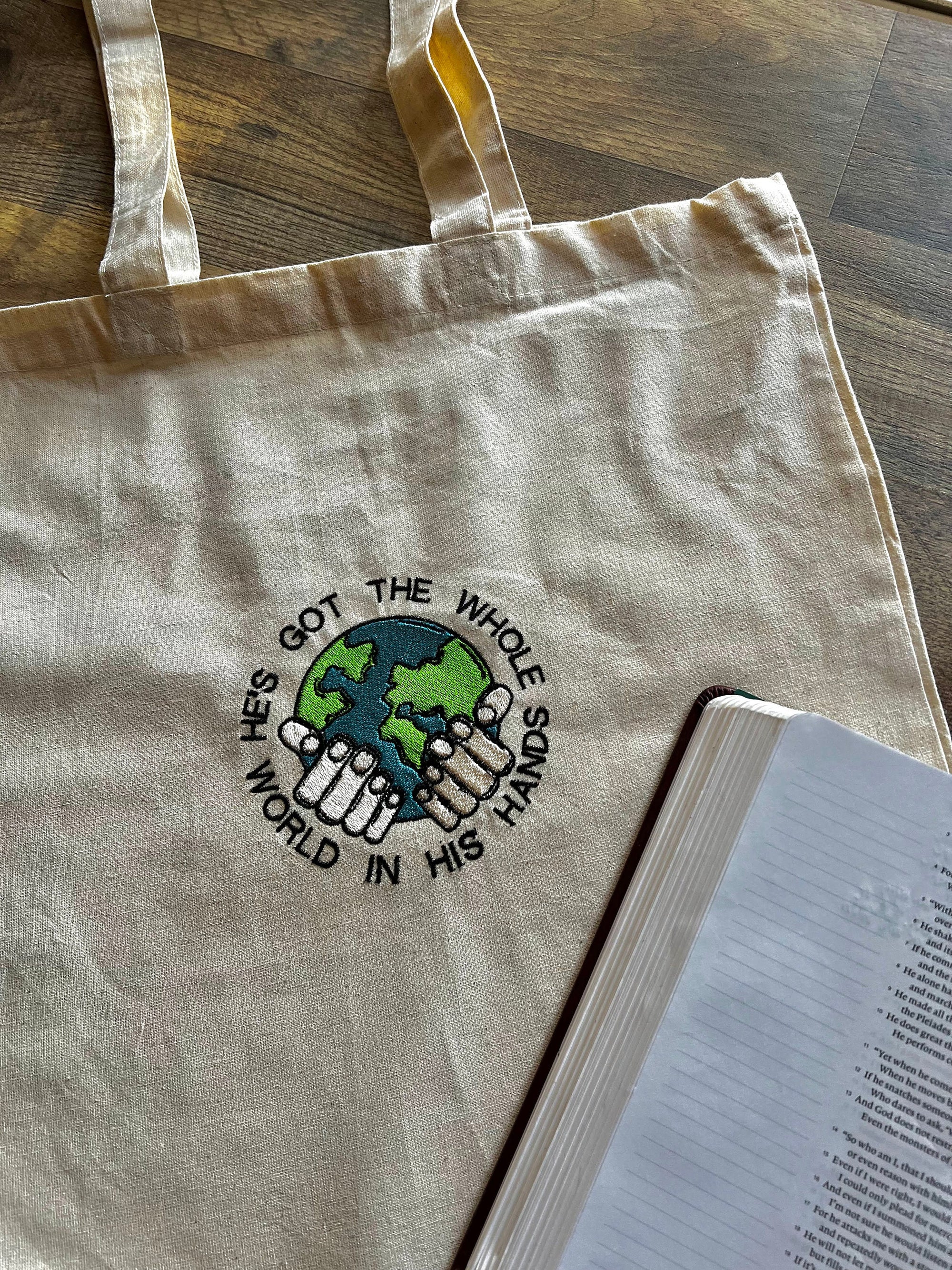 “He’s Got the Whole World in His Hands” Tote Bag