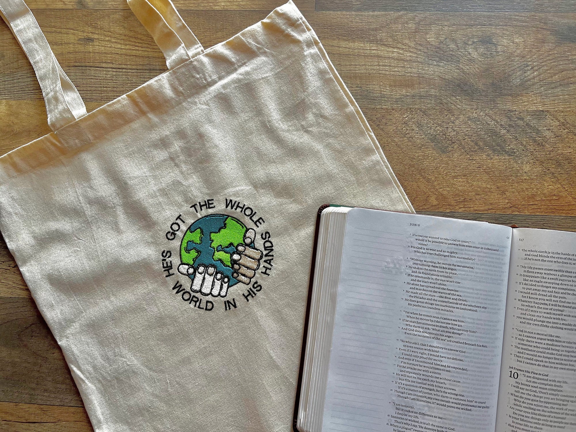“He’s Got the Whole World in His Hands” Tote Bag