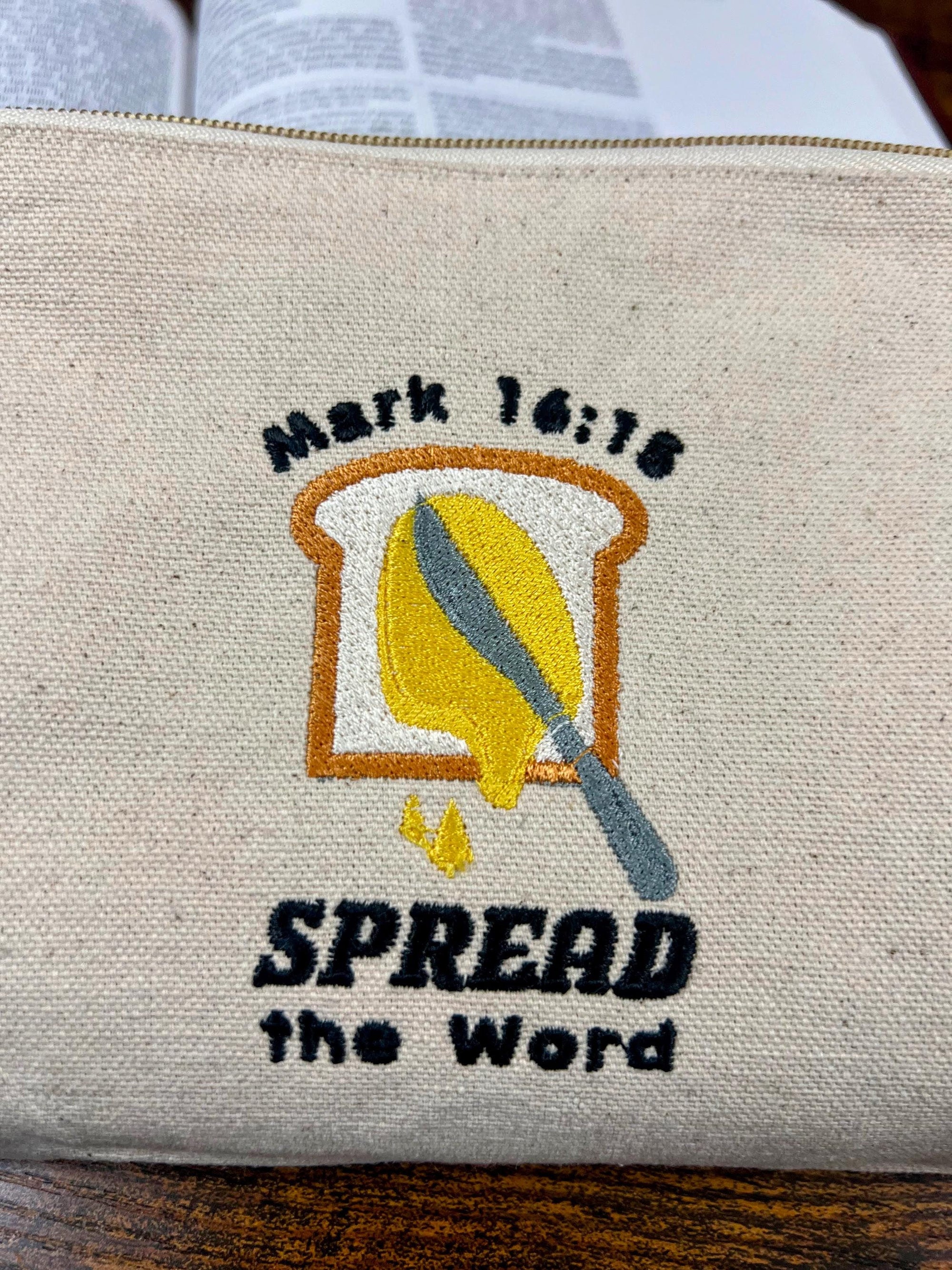 “Spread the Word” Zippered Canvas Pouch